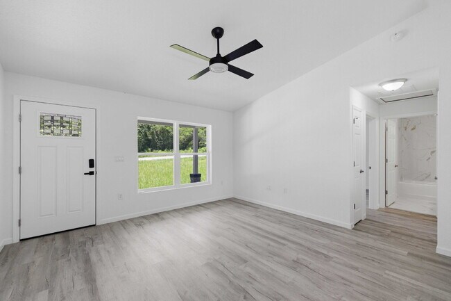 Building Photo - Available Now! New 3/2 Home with Large Backyard and Front Porch