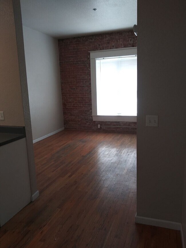 Building Photo - PRICED REDUCED!! Large windows and exposed...