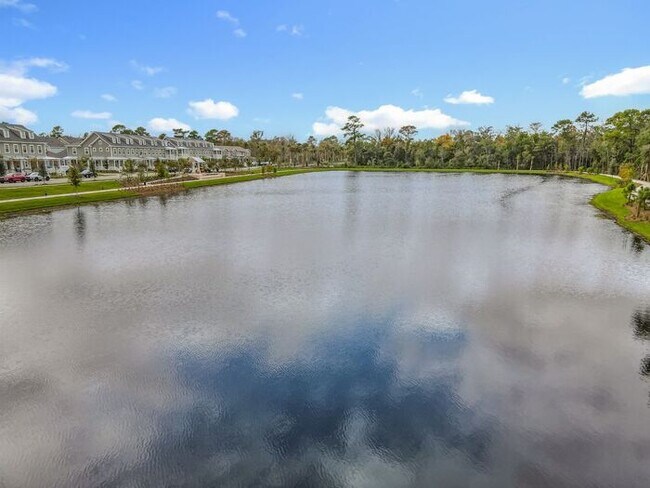 Building Photo - New Luxury Townhome in Celebration with All porcelain tiled floors. Island Village new construction