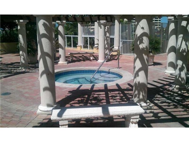 Building Photo - Rare 2/2 Corner Penthouse with Panoramic Lagoon Views from Every Room – Available Now!