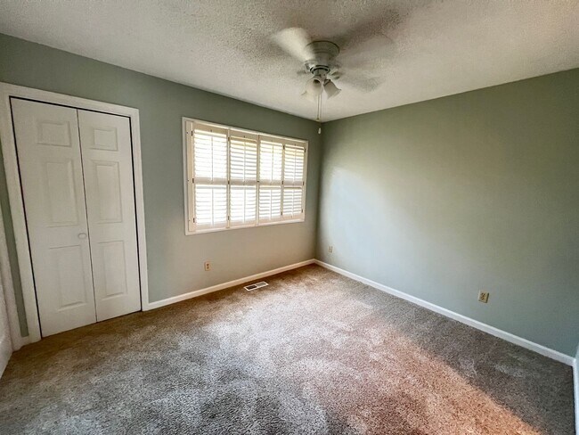 Building Photo - Stunning and Spacious 2 Bedroom, 2.5 Bath, Town Home With Sunroom and Deck!