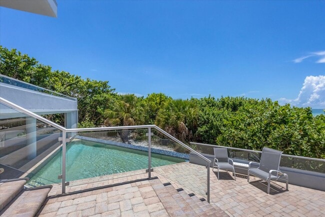 Building Photo - Beach Access & Gulf Views From This Incred...