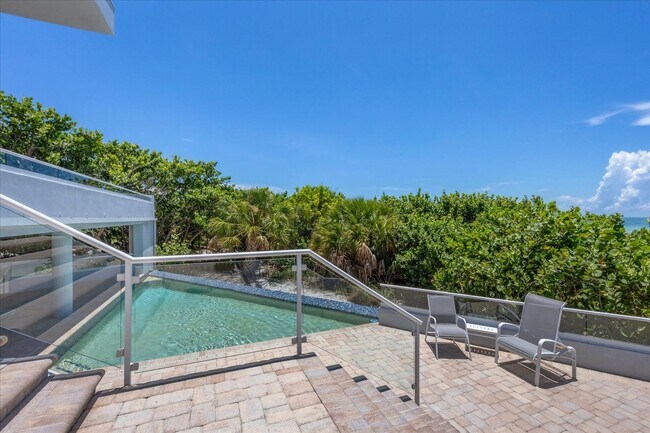 Building Photo - Beach Access & Gulf Views From This Incredible Luxury Home on Longboat Key