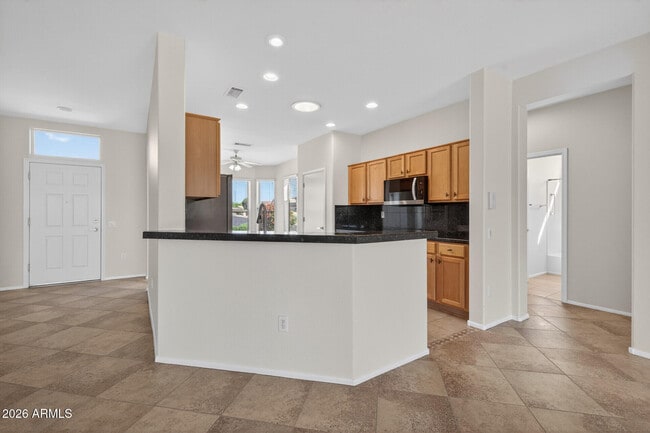 Building Photo - 15243 W Camino Estrella Dr