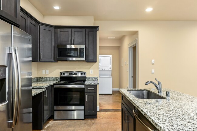 Building Photo - Sophisticated One-Bedroom Living at Marigold Apartments — Available Now