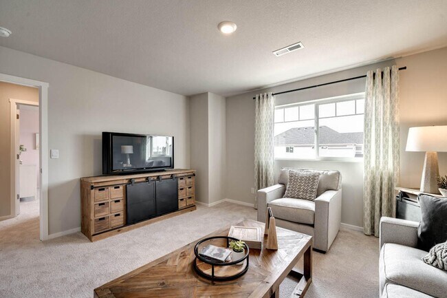 Building Photo - Modern 4 bedroom with den and neighborhood pool!