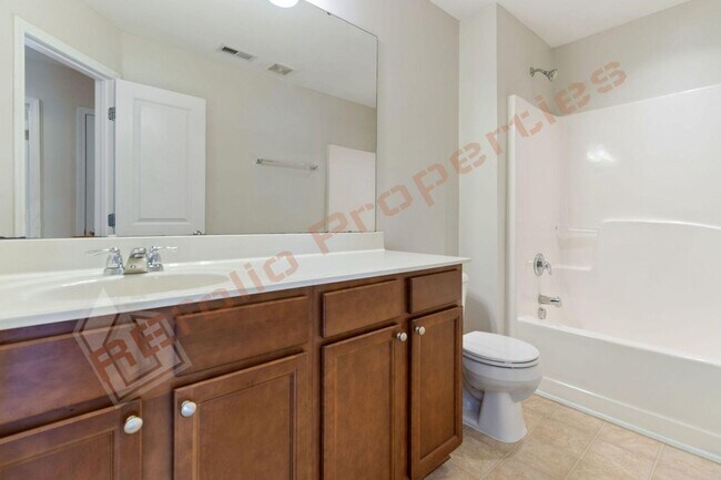Building Photo - Luxury 3-Story Townhome, No Carpet 4 Bedro...