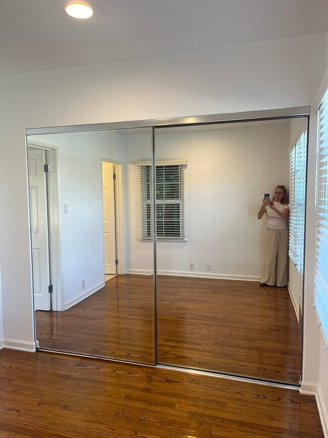 LARGE MIRRORED CLOSET - 10878 National Blvd