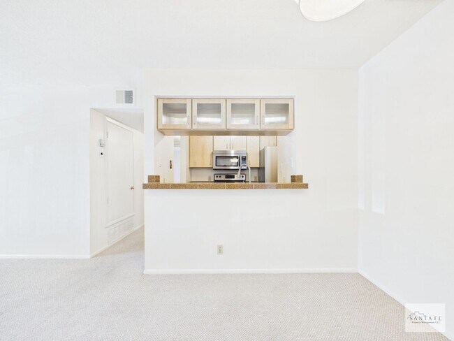 Building Photo - Two Bedroom Second Level Condo Available Now!