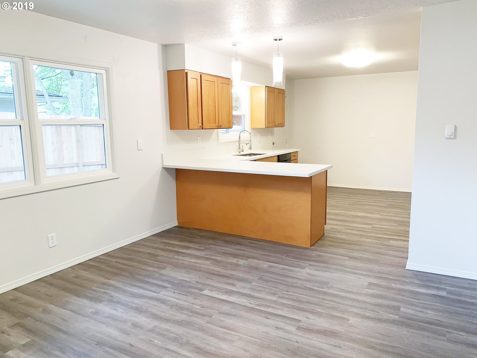 Updated Kitchen and dining area. - 15421 SE Stark Street