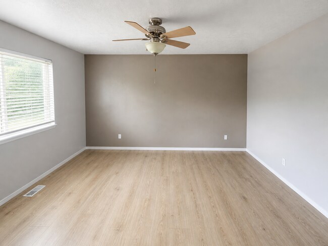 Building Photo - Spacious Home with 3-Car Garage, Two Living Areas & Covered Patio
