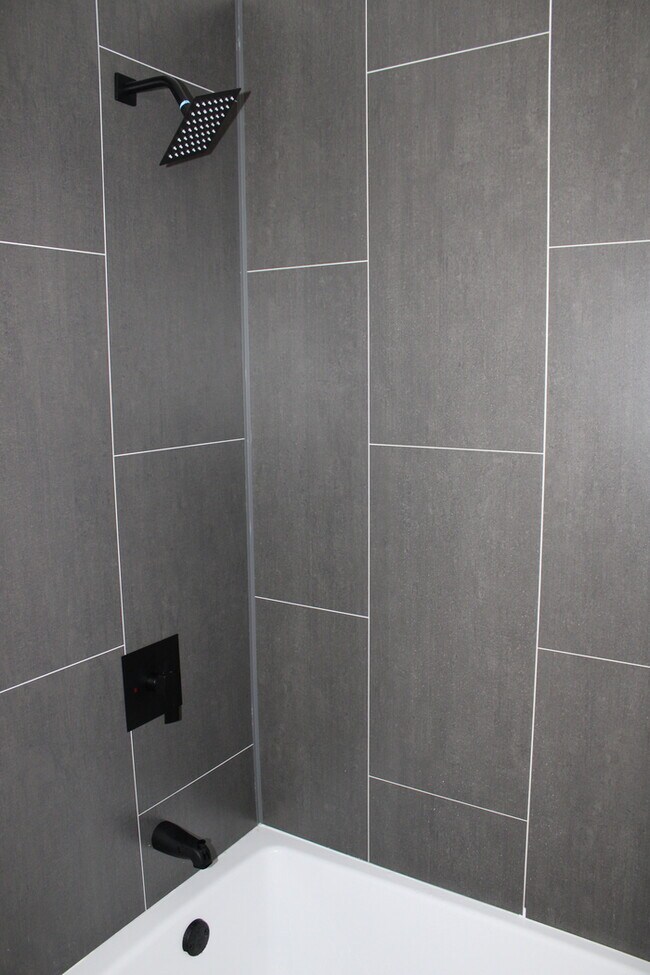 Building Photo - Move in Special - Spacious 5 Bedroom and 2...