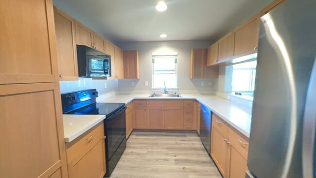 Building Photo - Welcome home to Kahoma Village