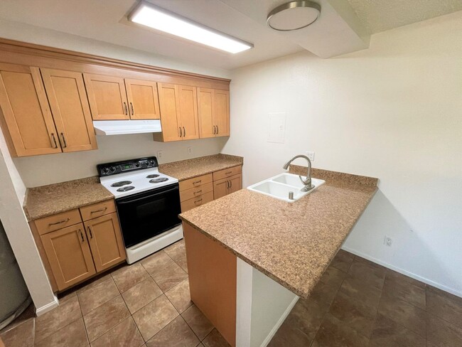 Building Photo - Centrally Located McKeon Condo