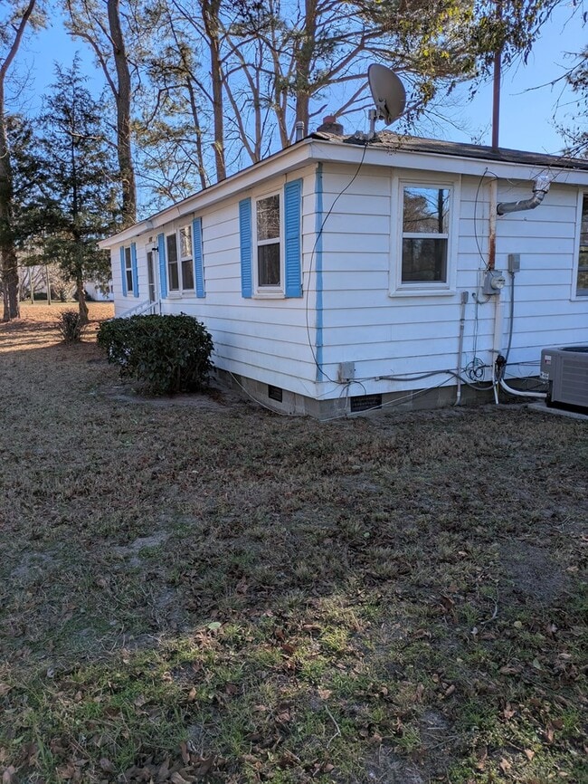 Building Photo - 7116 Martins Siding Rd