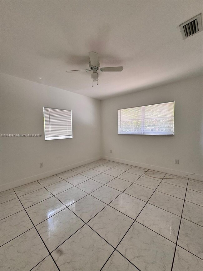 Building Photo - 1310 NW 115th St