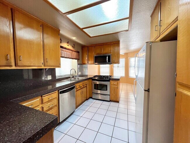 Building Photo - Spacious 4 Bed / 2 Bath Home with Loft, Fireplace & Beautiful Outdoor Entertaining Area!
