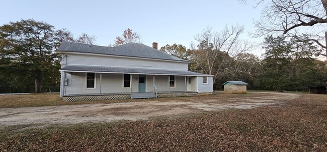 Building Photo - Enjoy a piece of history in this Vintage Farm House