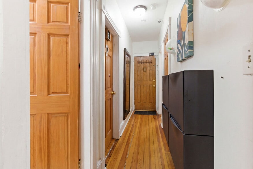 Hallways facing front door - 22 Deering Rd