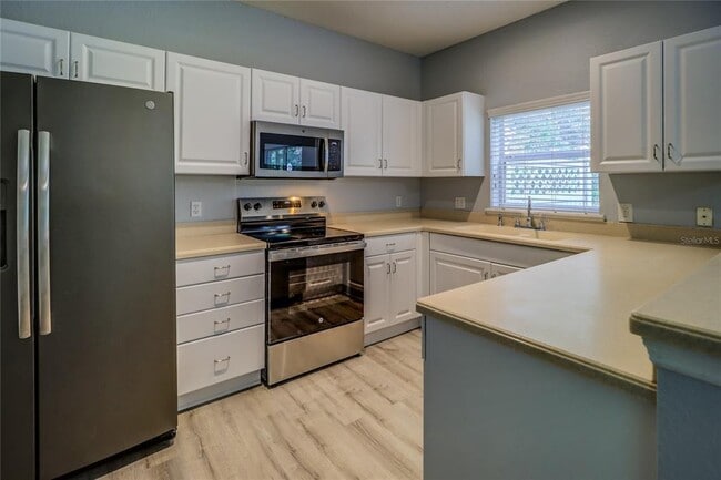 Building Photo - 6265 Ashbury Palms Dr