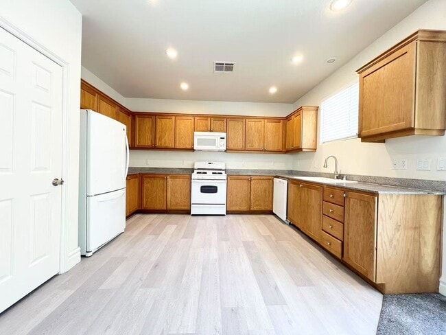 Building Photo - 9773 Marcelline Ave