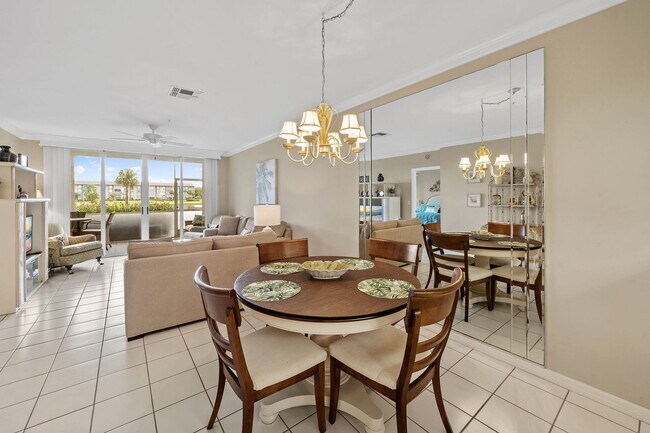 Building Photo - first-floor unit featuring a 2 bedroom, 2 bath fully furnished