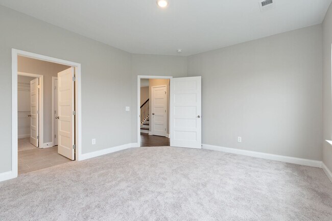 Building Photo - **BE THE LUCKY ONE TO LIVE IN THIS 2022-BUILT UPSCALE COTTAGE HOME IN THE PRESERVE AT BELLE POINTE**