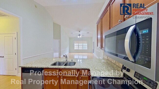 Building Photo - 3 BD/2.5 BA Townhouse w/Open Floorplan, Split Bedrooms and Garage