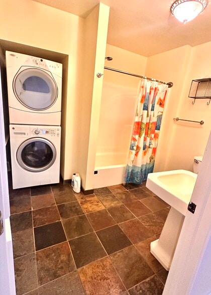 Full bathroom and full size in-unit washer and dryer - 1301 W Strasburg Rd
