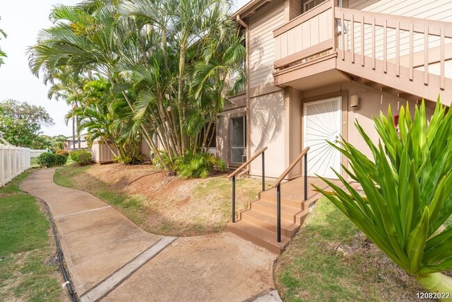 Building Photo - 2bd 1.5 ba 2 pkg townhome at Palm Villas g...