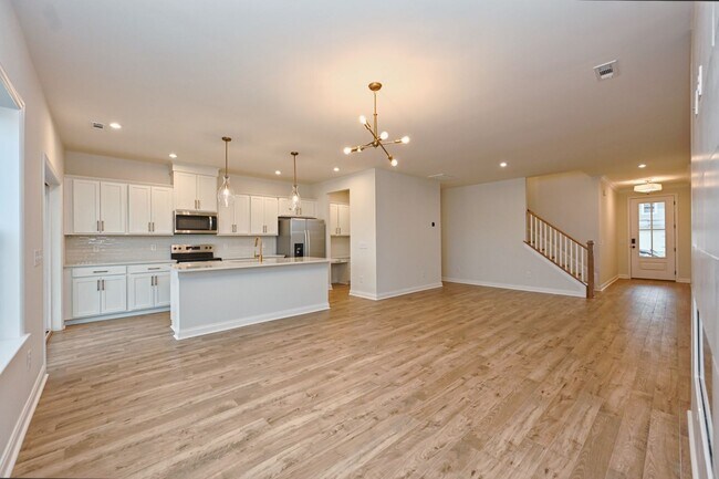 Building Photo - **BE THE LUCKY ONE TO LIVE IN THIS 2024-BUILT TOWNHOME**