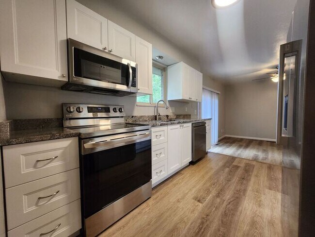 Building Photo - Move-In Ready 5-Bedroom Gem – Enjoy 50% Of...