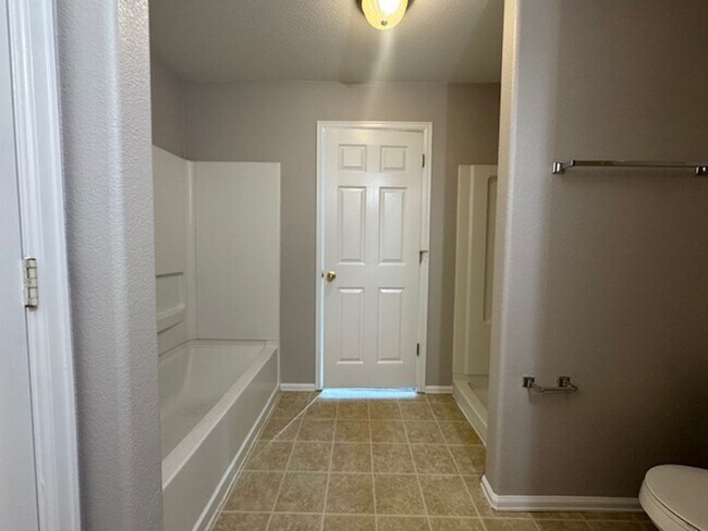 Building Photo - Charming 3BD Townhome in Gated Community just minutes from Peterson AFB & Fort Carson - Security ...