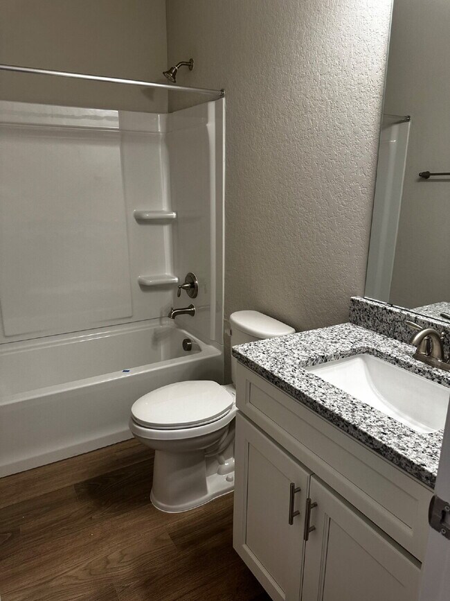 Building Photo - "Charming 3-Bedroom Duplex in San Antonio with Granite Elegance!"