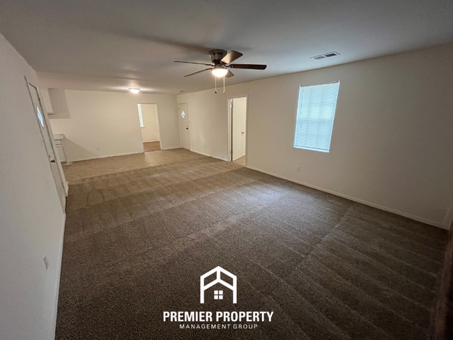 Building Photo - Spacious 3BR/2BA Home with Den & Living Room | Brick Fireplace & Large Yard