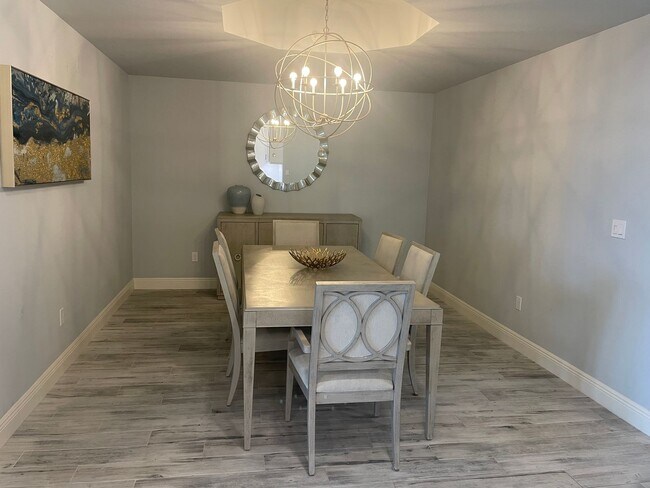 Building Photo - Coastal Luxury at Hidden Bay | 3BR Waterfront Condo with Bay Views