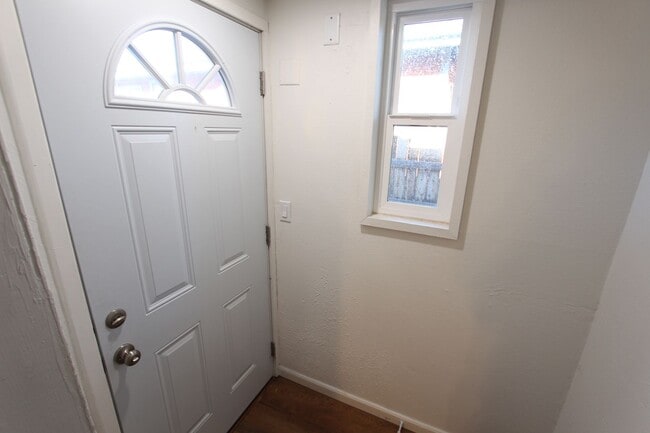 Building Photo - $500 Move-In Special! Remodeled Unit with Community Garden