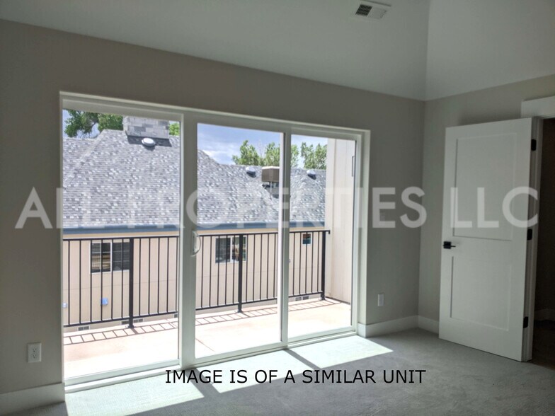 Building Photo - 8059 W 52nd Dr