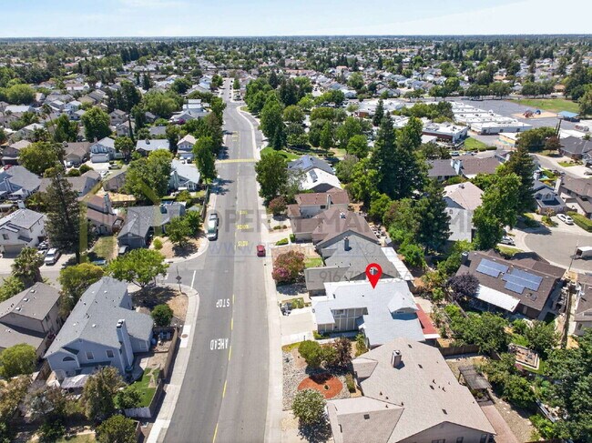 Building Photo - Spacious 4-Bedroom Retreat with 2.5 Baths