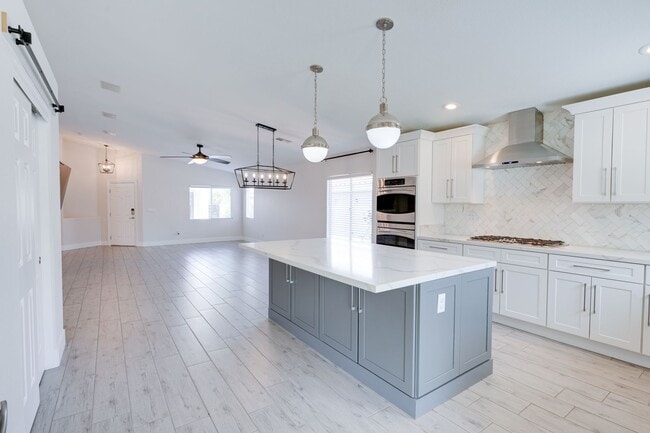 Building Photo - Comfort and Style in a Secure Gated Community: Stylish 4-Bedroom Single-Story Home