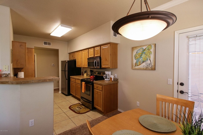 Building Photo - 7050 E Sunrise Dr