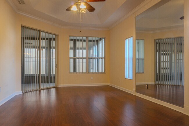 Building Photo - Spacious 5BR Home in Falcon Trace | 3-Car Garage | Screened Patio | Resort-Style Amenities Rent: ...