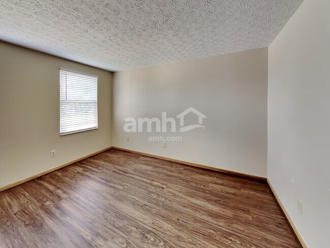 Building Photo - 7394 Winchester Cathedral Ct
