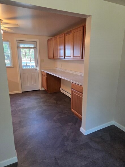 8 foot long kitchen counter to for stool seating and preparing meals. - 102 Stonecrest