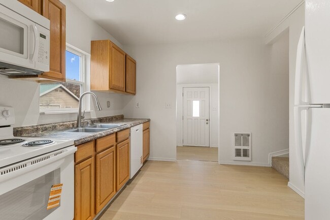 Building Photo - Charming 3-Bedroom, 1-Bathroom Home with Upstairs Bonus Area