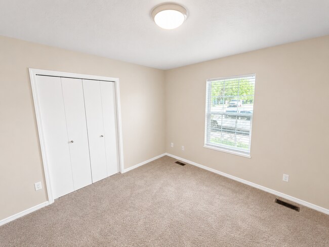 Building Photo - Easy-Living 3 Bed, 2 Bath Home with Double Garage, Pool Access & Private Courtyard