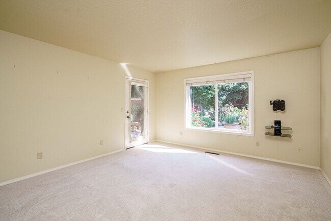 Building Photo - Beautifully Landscaped 1/4 acre with Well Maintained 4 bedroom 2 Bath Home with 3 Car Garage
