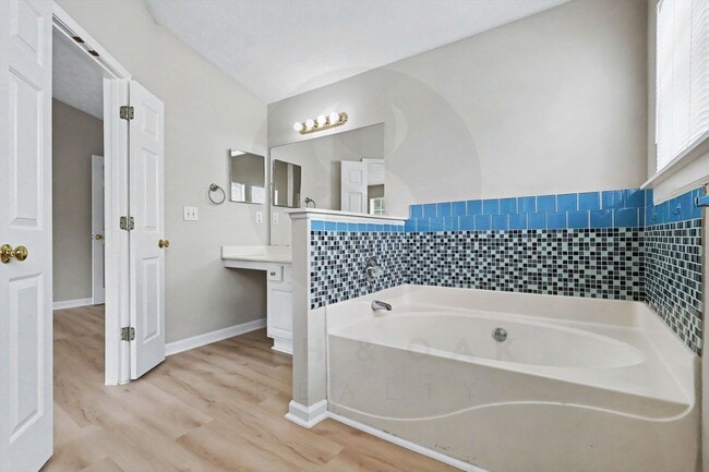 Building Photo - 4BR/2.5BA Home Conveniently Located Off Jimmy Carter Blvd!