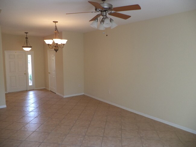 Building Photo - GATED COMMUNITY WITH COMMUNITY POOL