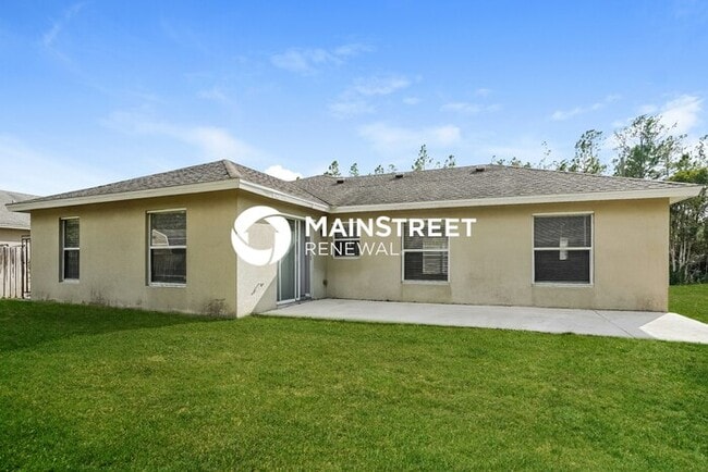 Building Photo - 3 Bedroom Pet-Friendly Home in Lehigh Acres, FL with Main Street Renewal